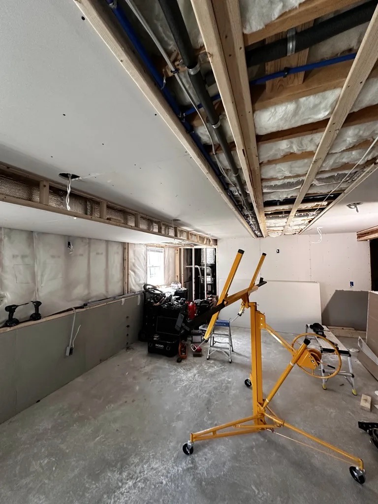 Drywall start — ceiling framing with drywall lift