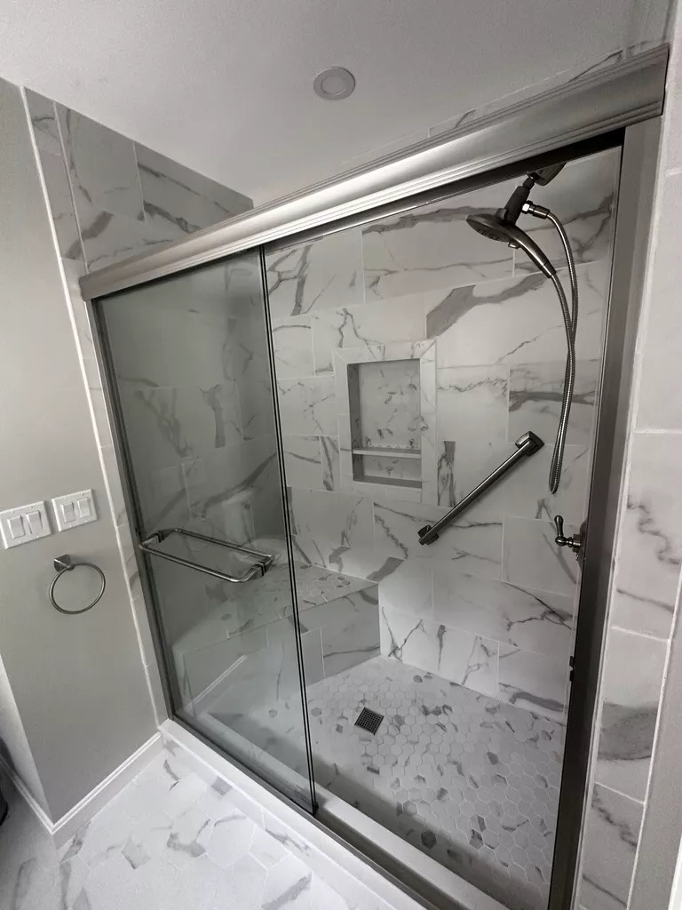 Marble shower — full view with glass sliding door