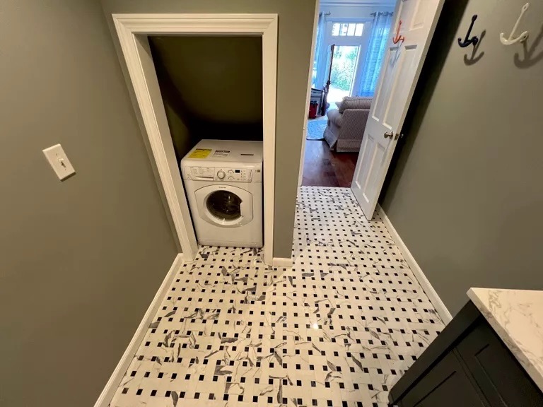 Bathroom and laundry area — basketweave tile floor