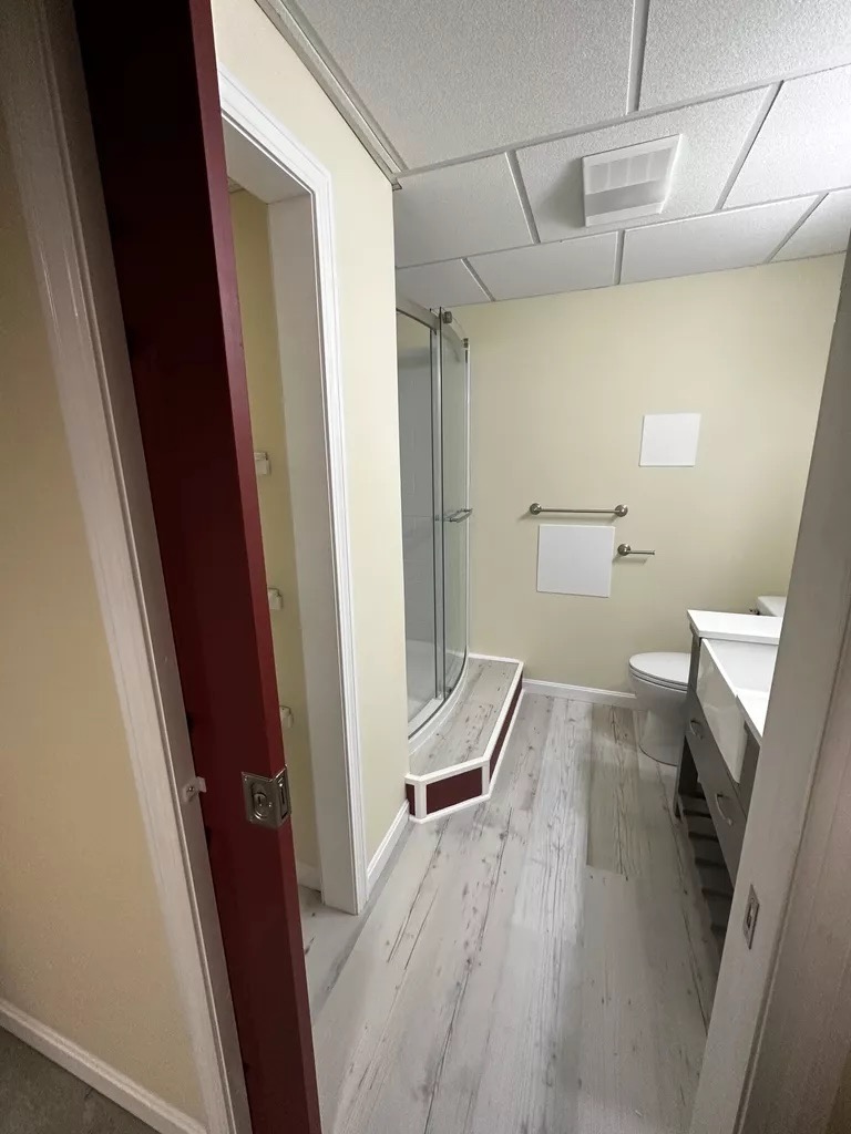 Finished bathroom — shower and full layout