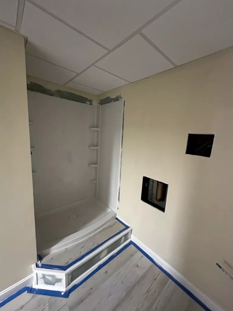 Bathroom — shower and drop ceiling near complete