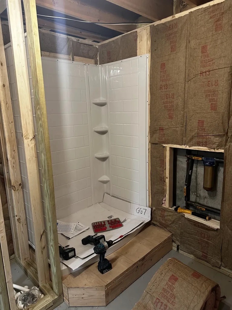 Bathroom — shower unit installed with framing