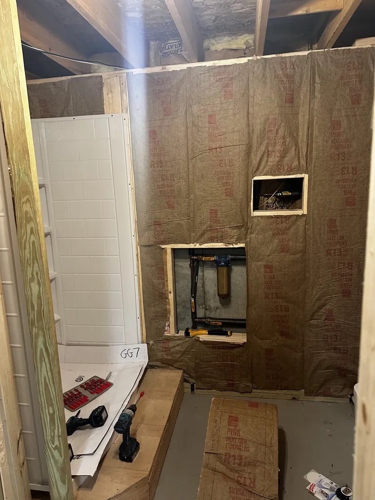 Bathroom rough-in — shower unit and insulation