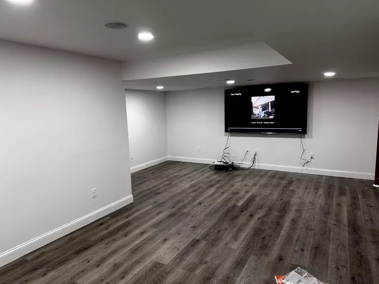 Finished rec room — TV wall and recessed lighting