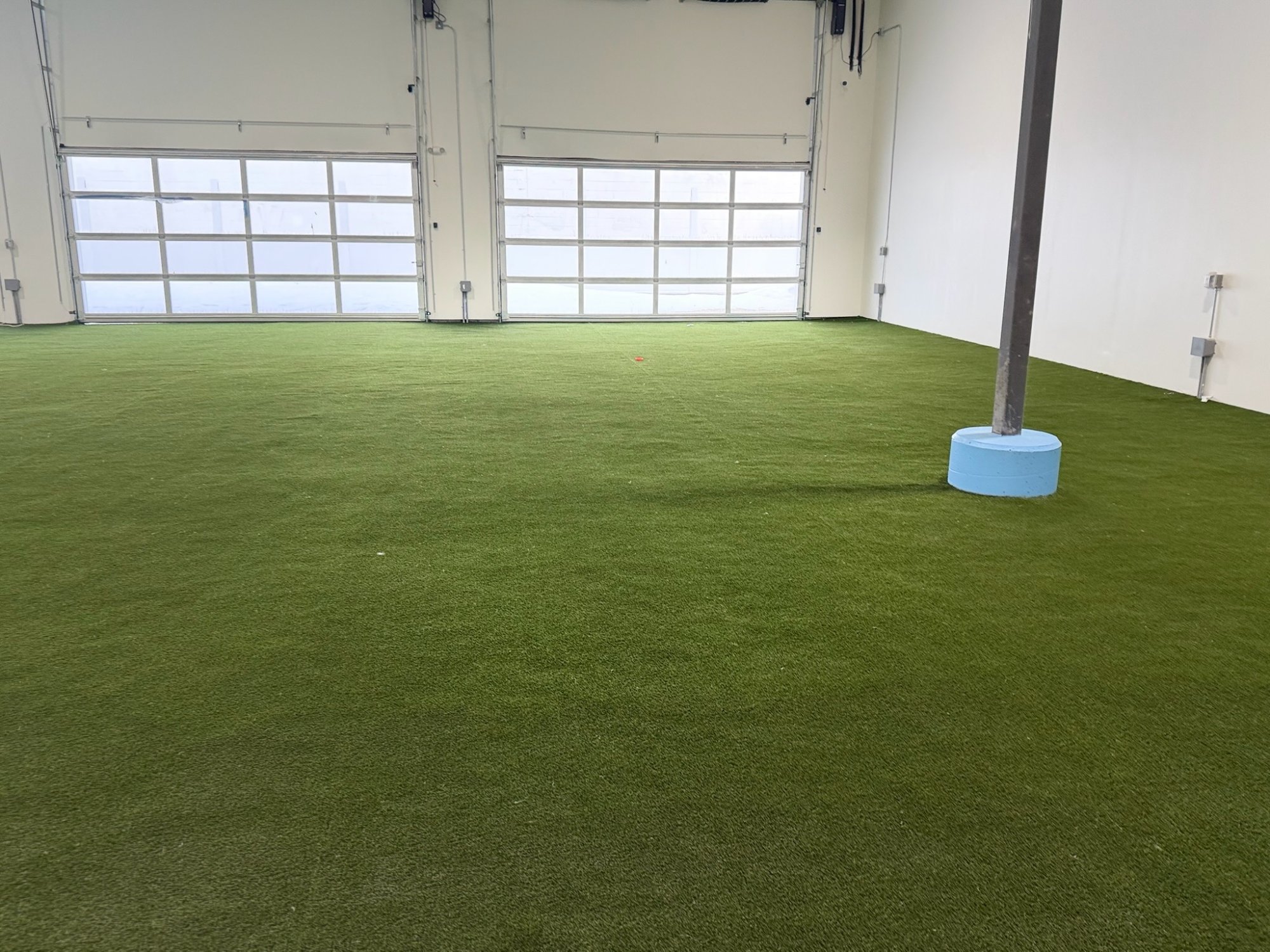 Completed turf area and overhead doors